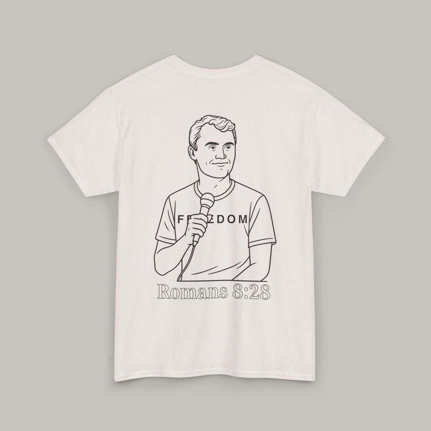 White t-shirt with a graphic of a person holding a microphone and text on a gray background