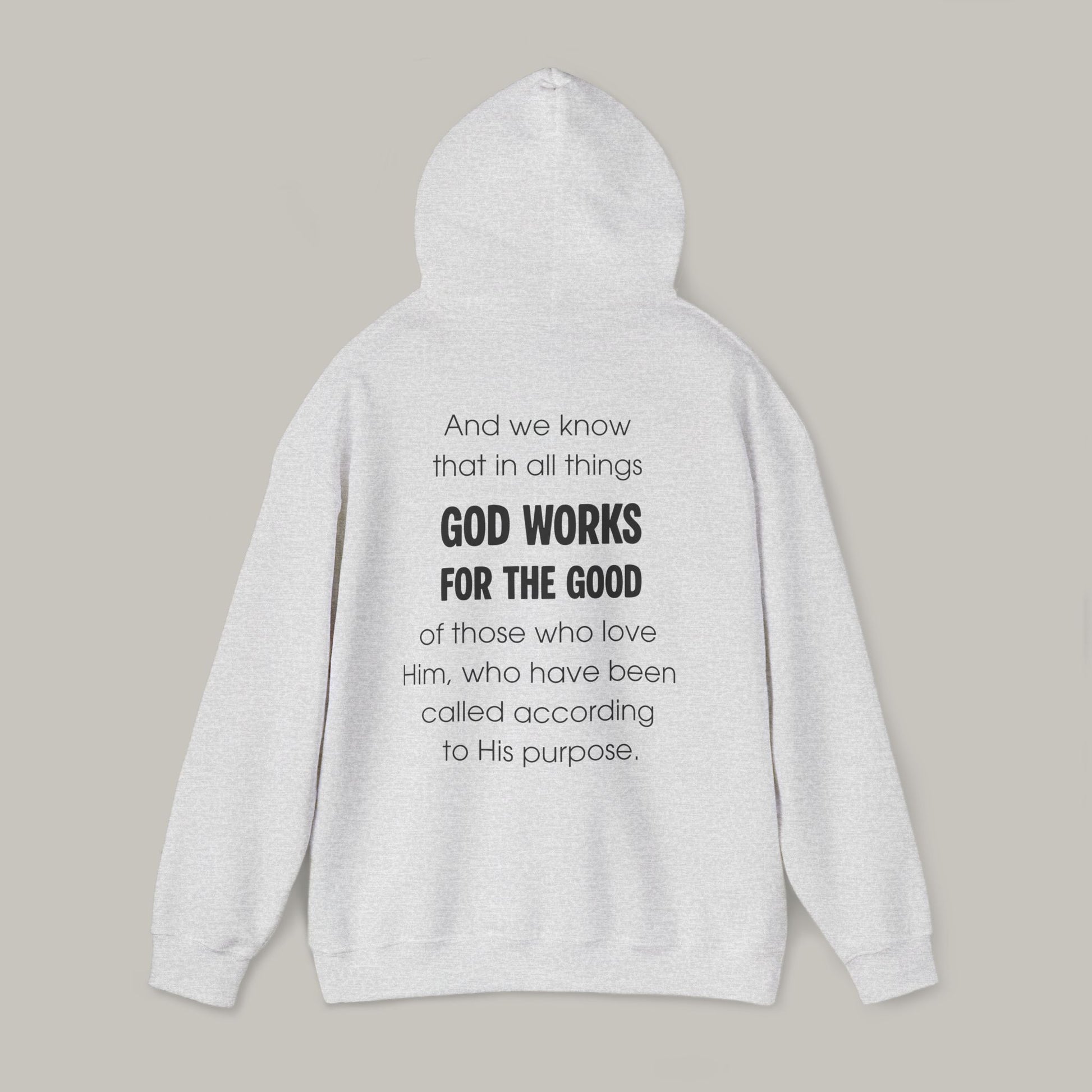 Gray hoodie with text on a beige background