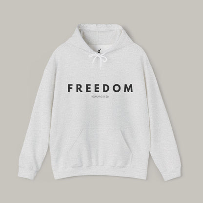 Gray hoodie with 'FREEDOM' text on a beige background