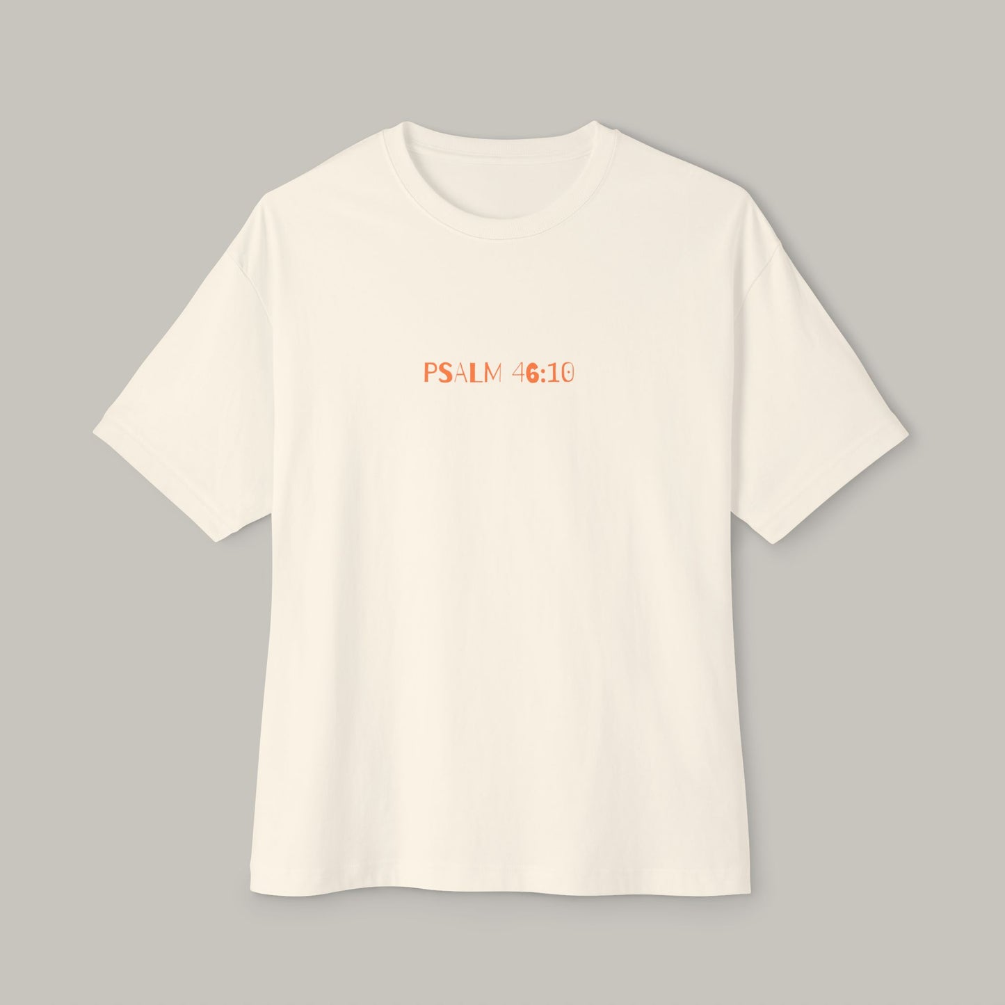 White t-shirt with 'PSALM 46:10' text on a gray background