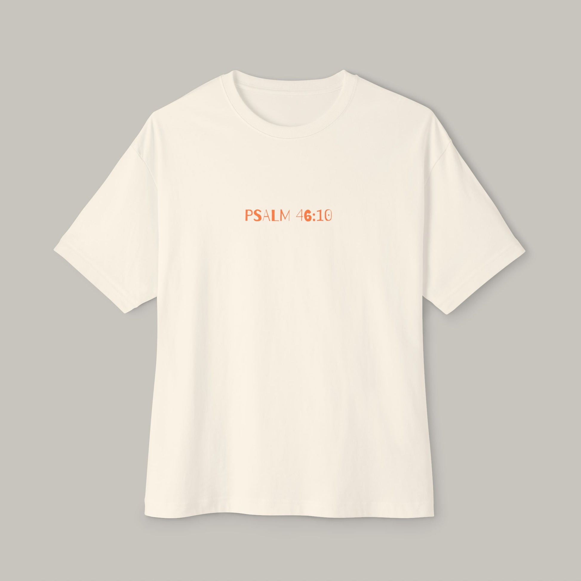 White t-shirt with 'PSALM 46:10' text on a gray background