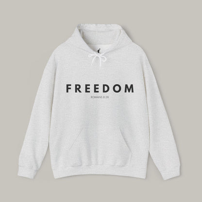 Gray hoodie with 'FREEDOM' text on a beige background