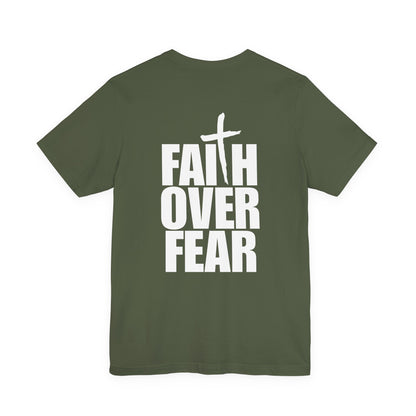 Green t-shirt with 'Faith Over Fear' text and cross on a white background