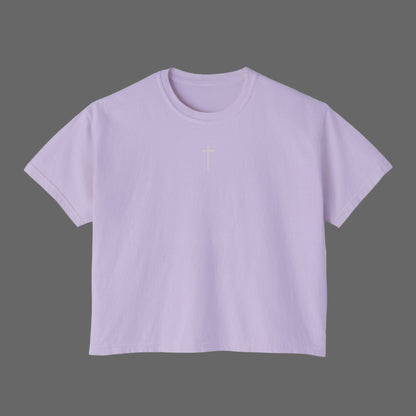 Lavender t-shirt with a small white logo on a white background
