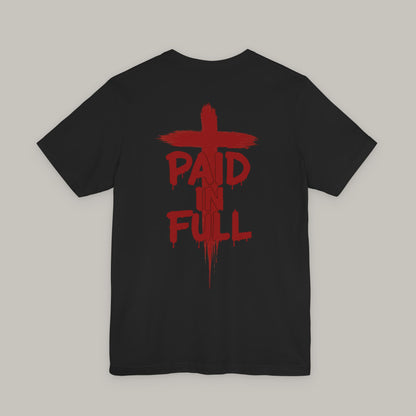 Black t-shirt with red graphic design on a gray background