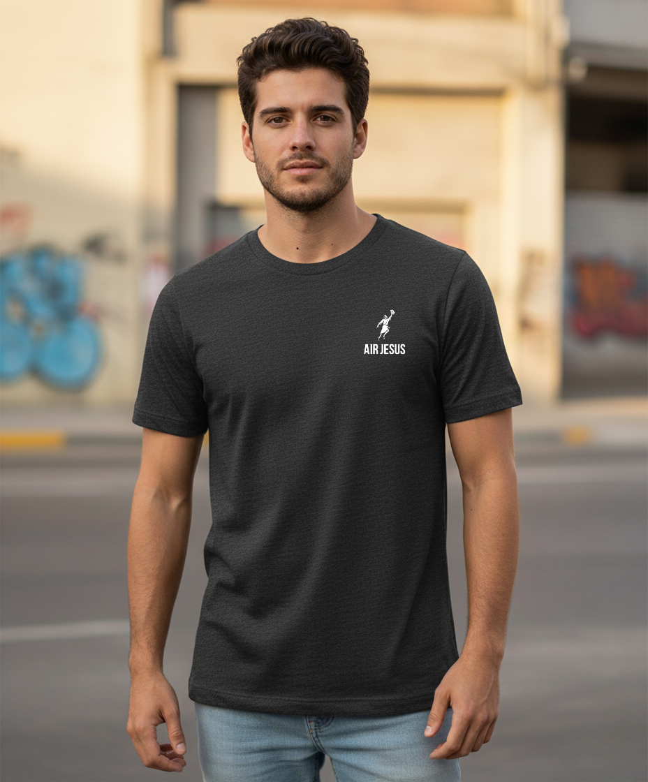 Man wearing a black t-shirt with an 'Air Jesus' logo and text, standing on a street.