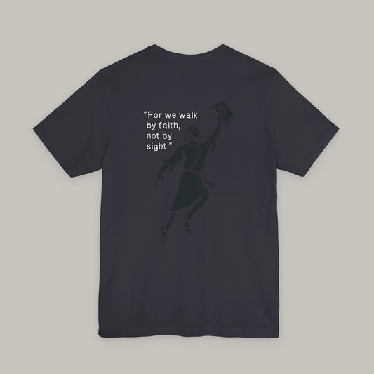 Black t-shirt with a silhouette and text on the back against a gray background